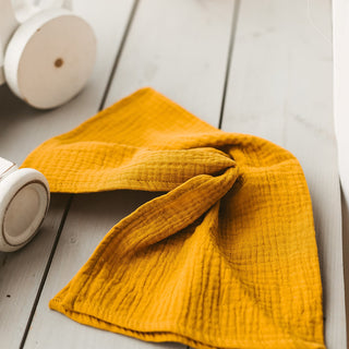 Mustard Baby Swaddles and Burp Cloths from Ultra soft Muslin